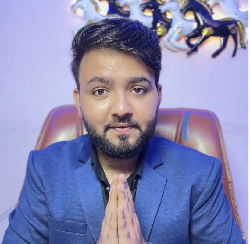 Avitosh Sood, founder of Karmic Astro-Tarot, with folded hands
